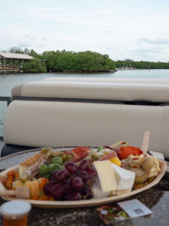 a plate of food and a cup of water
