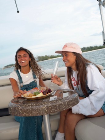 a person sitting on a boat in the water